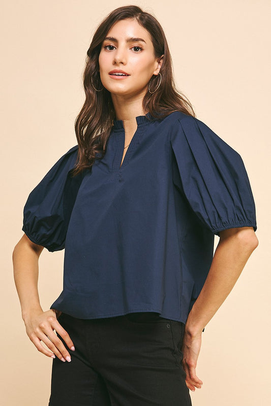 SHORT SLEEVE TOP WITH PLEATED SLEEVE